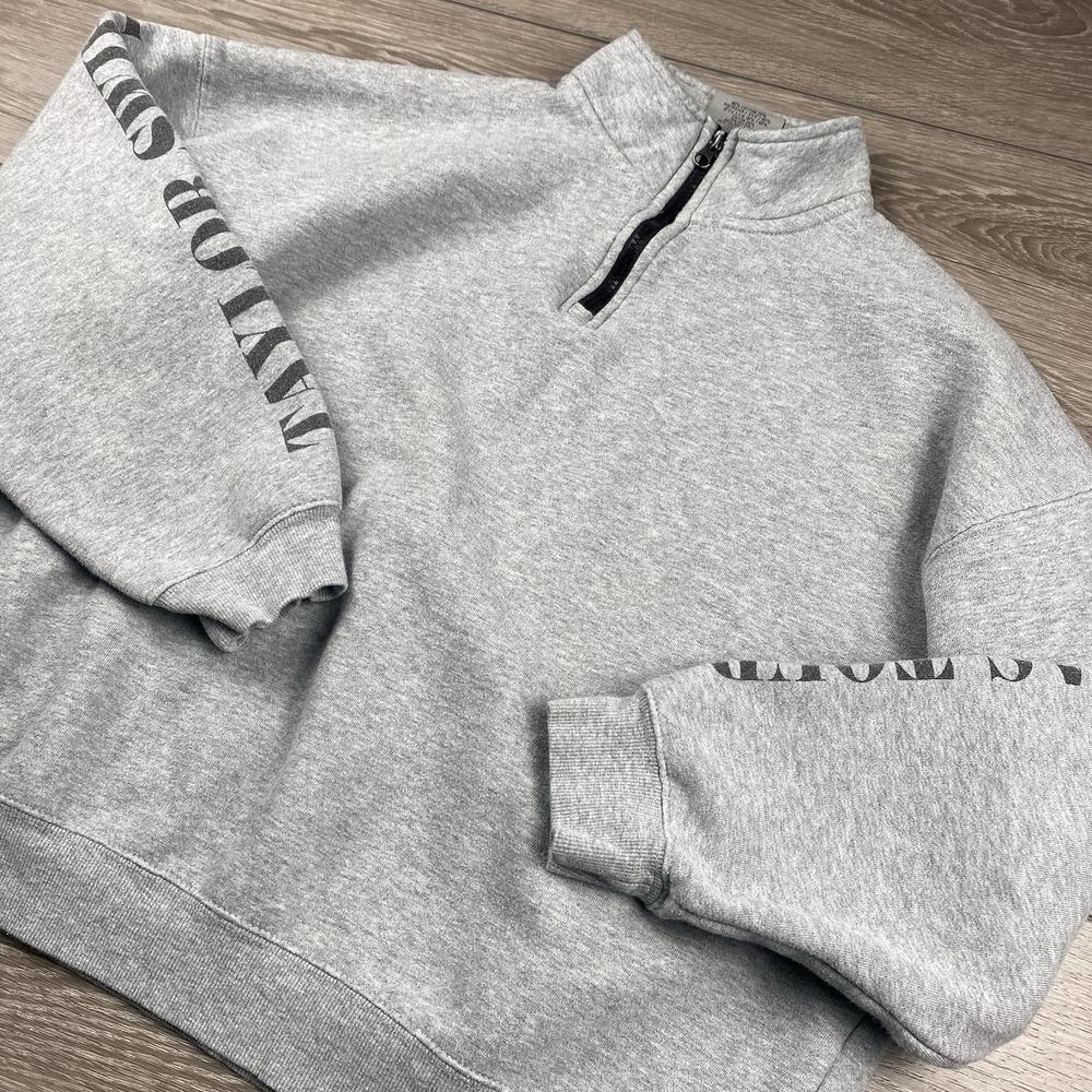 Taylor Swift Gray Half-Zip Sweatshirt with Black Lettering